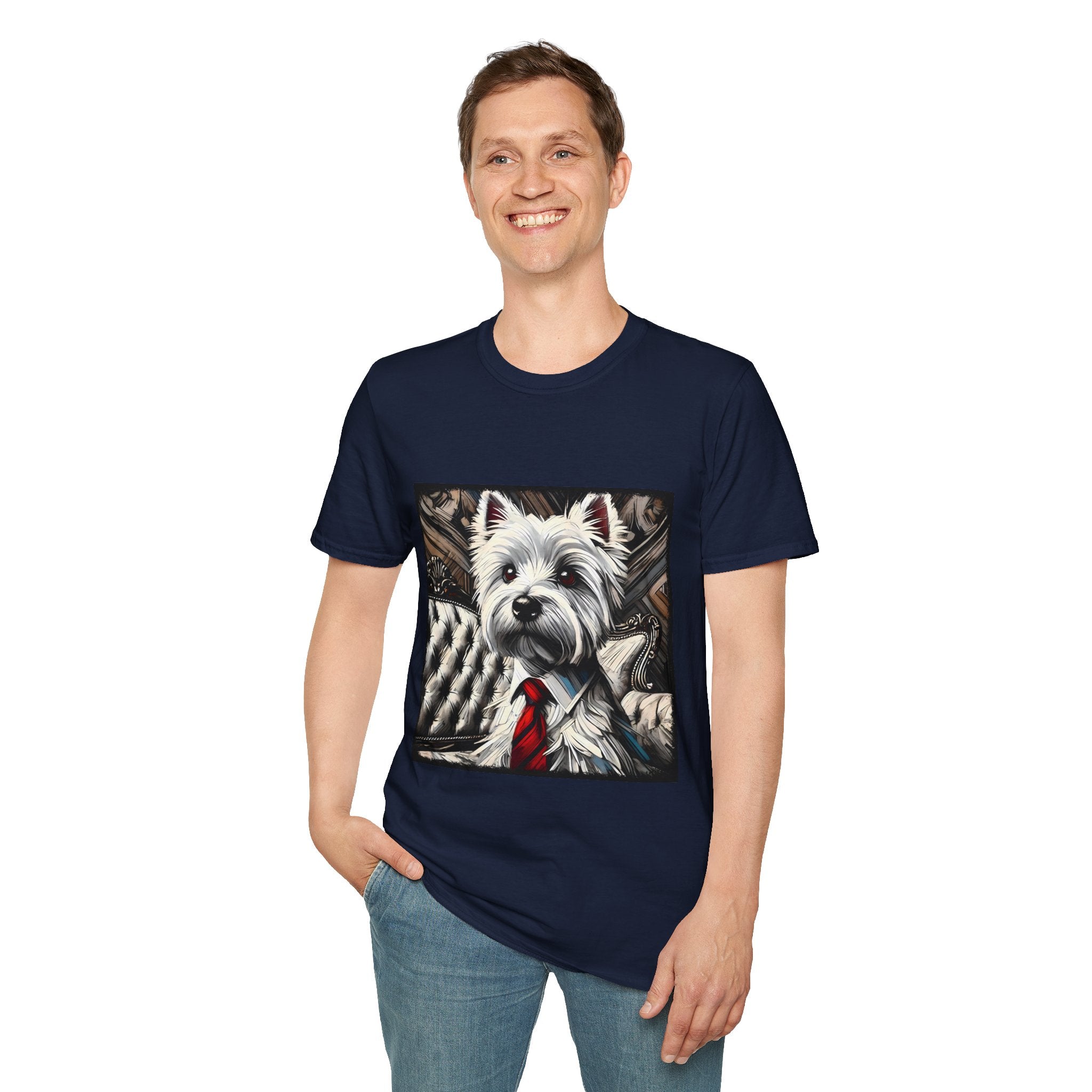 Male model in navy blue dog t-shirt featuring a Westie in a red tie seated on a tufted chair in a wood-accent room.