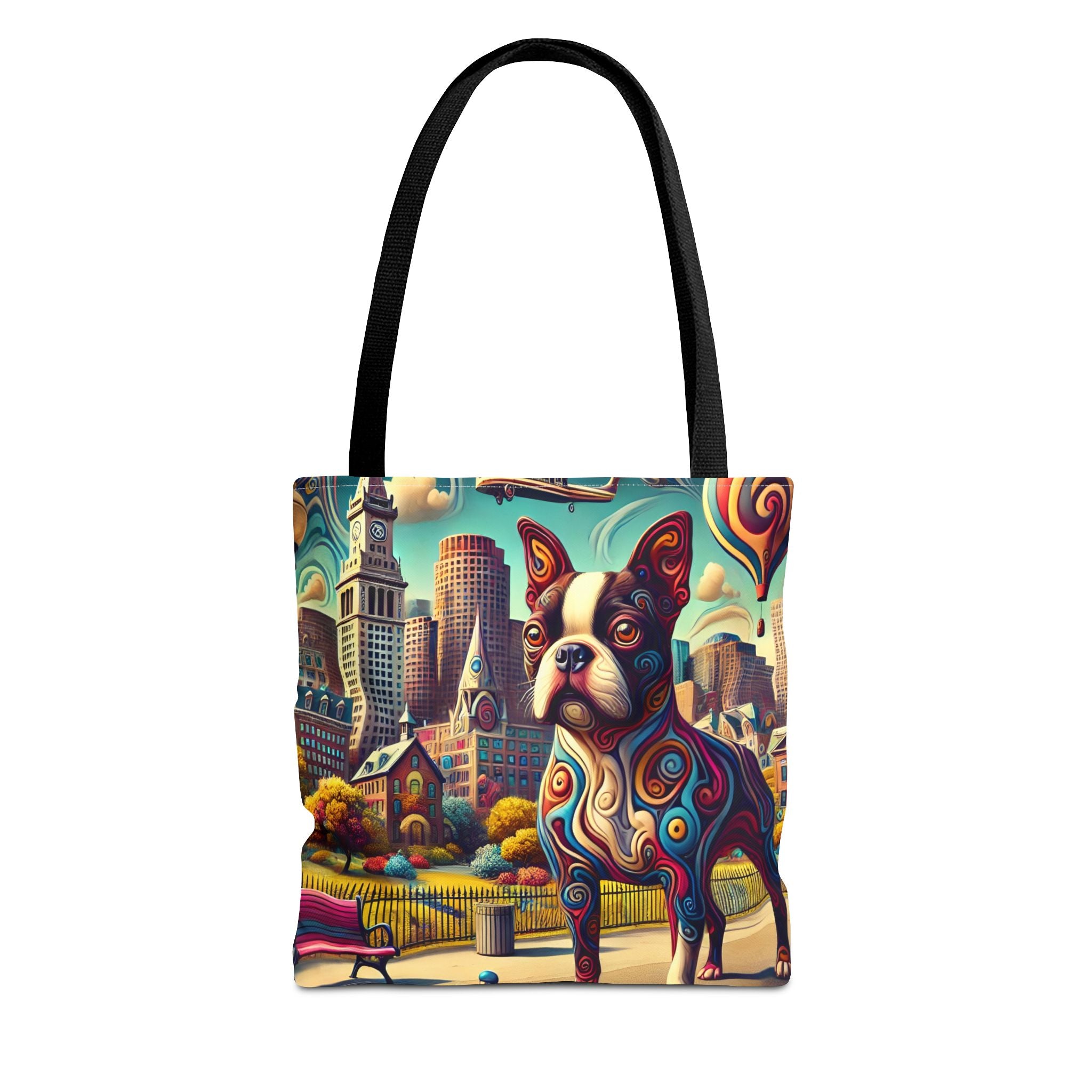 A tote bag with black shoulder straps, featuring a colorful printed design of a Boston Terrier dog in front of a stylized city skyline. The dog is decorated with swirling multicolor patterns, and the background of the print includes houses, trees, and park elements.