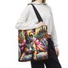 A person wearing a white hoodie and black sweatpants carries a large tote bag with a colorful painted dog design. The bag has a black shoulder strap and features an artistic print of a bulldog with pink bows and a jeweled collar against a multicolored background.
