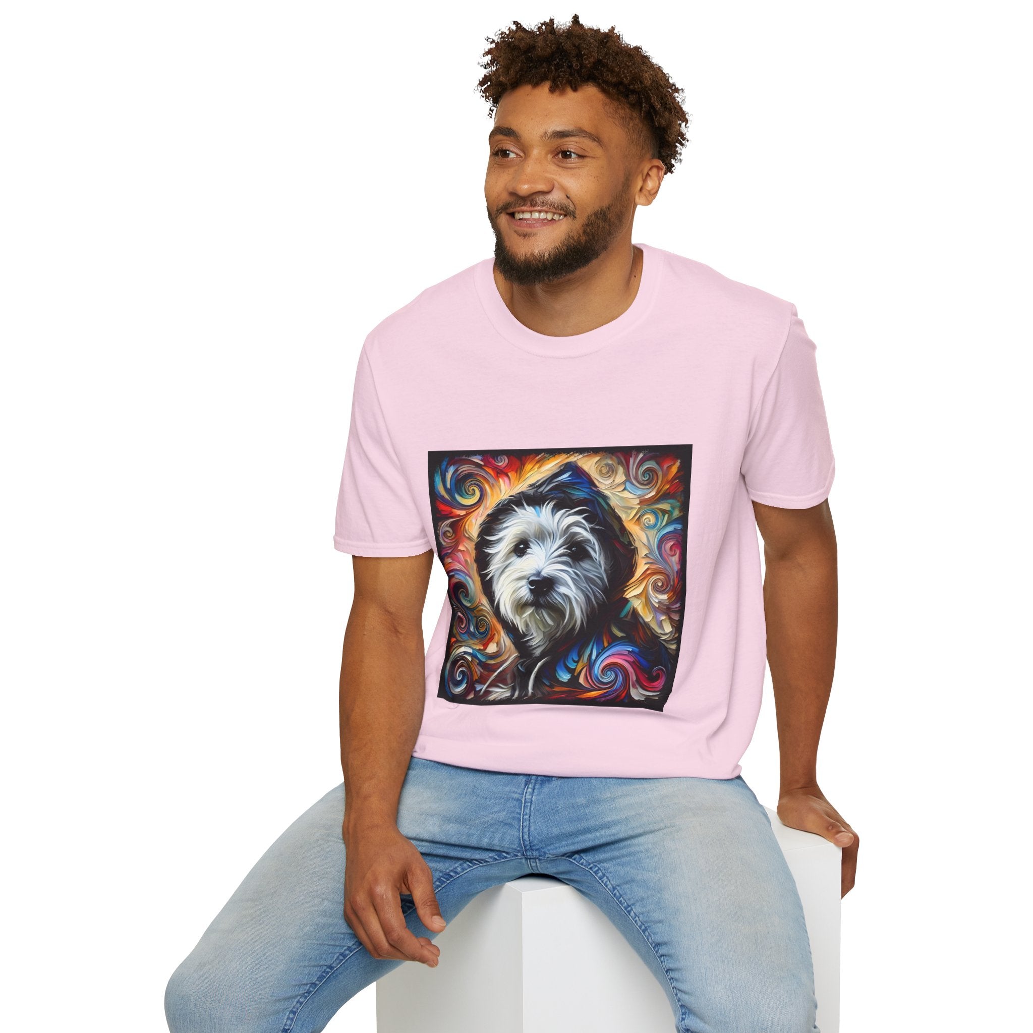 Male model in light pink dog t-shirt featuring Westie in black hoodie with swirling red blue orange and gold background.