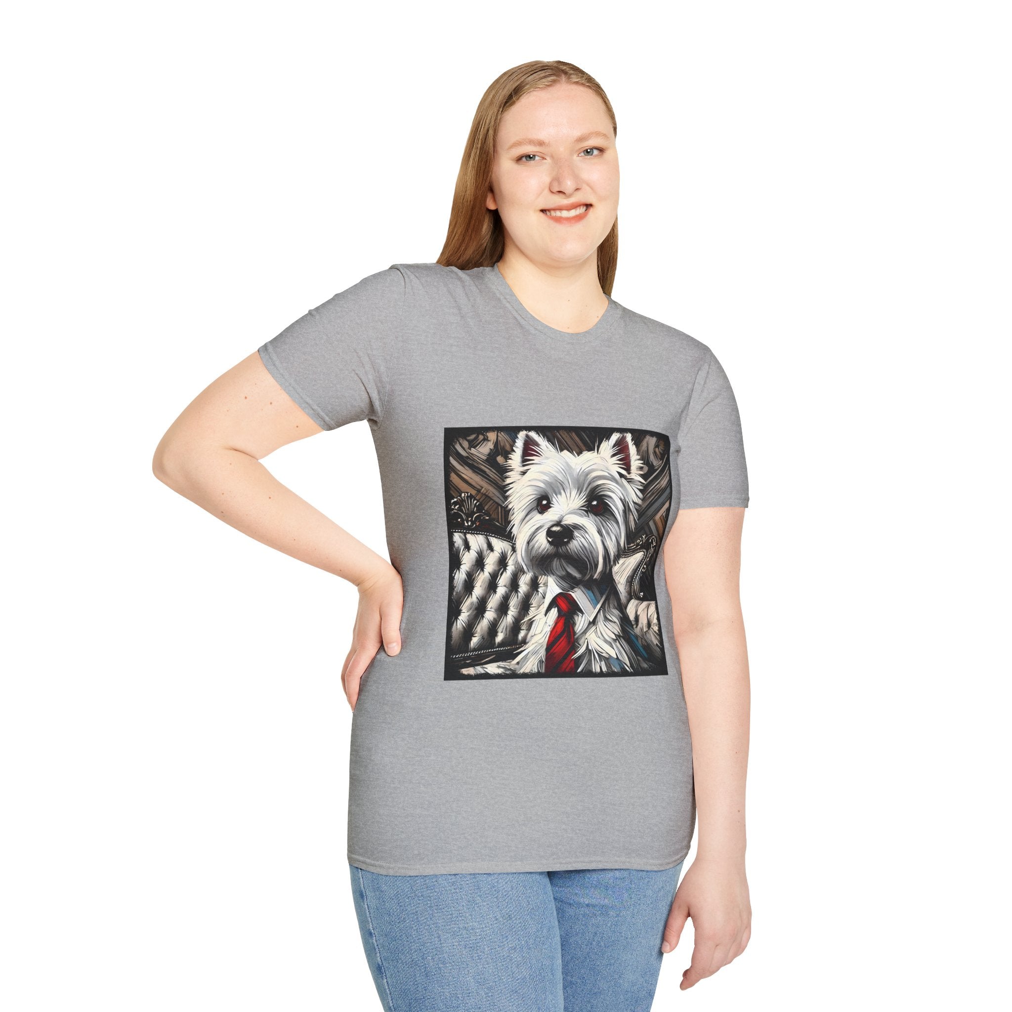 Female model in sport gray dog t-shirt featuring a Westie in a red tie seated on a tufted chair in a wood-accent room.