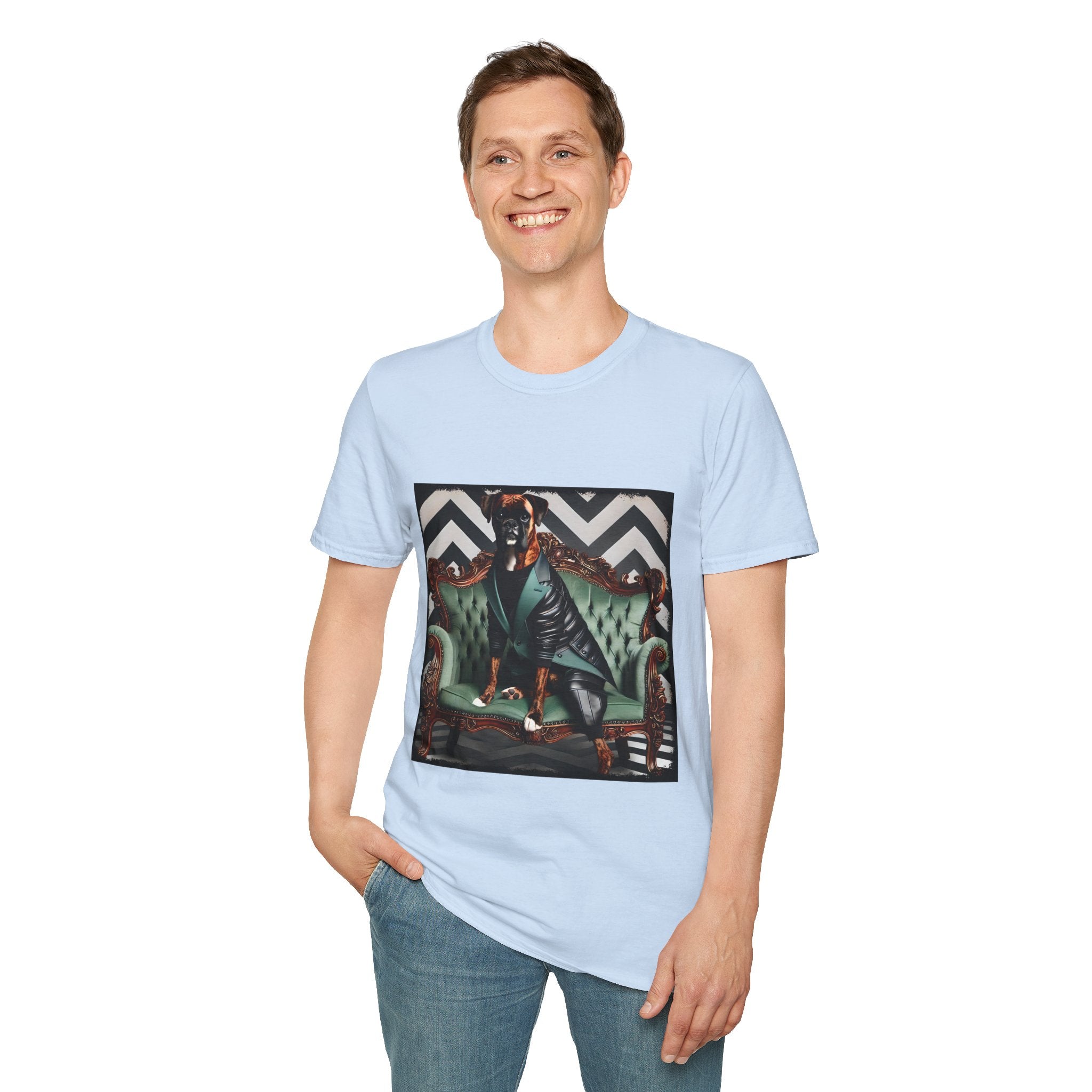 Male model in light blue dog t-shirt featuring a brindle boxer in leather jacket on green settee with chevron wall backdrop.