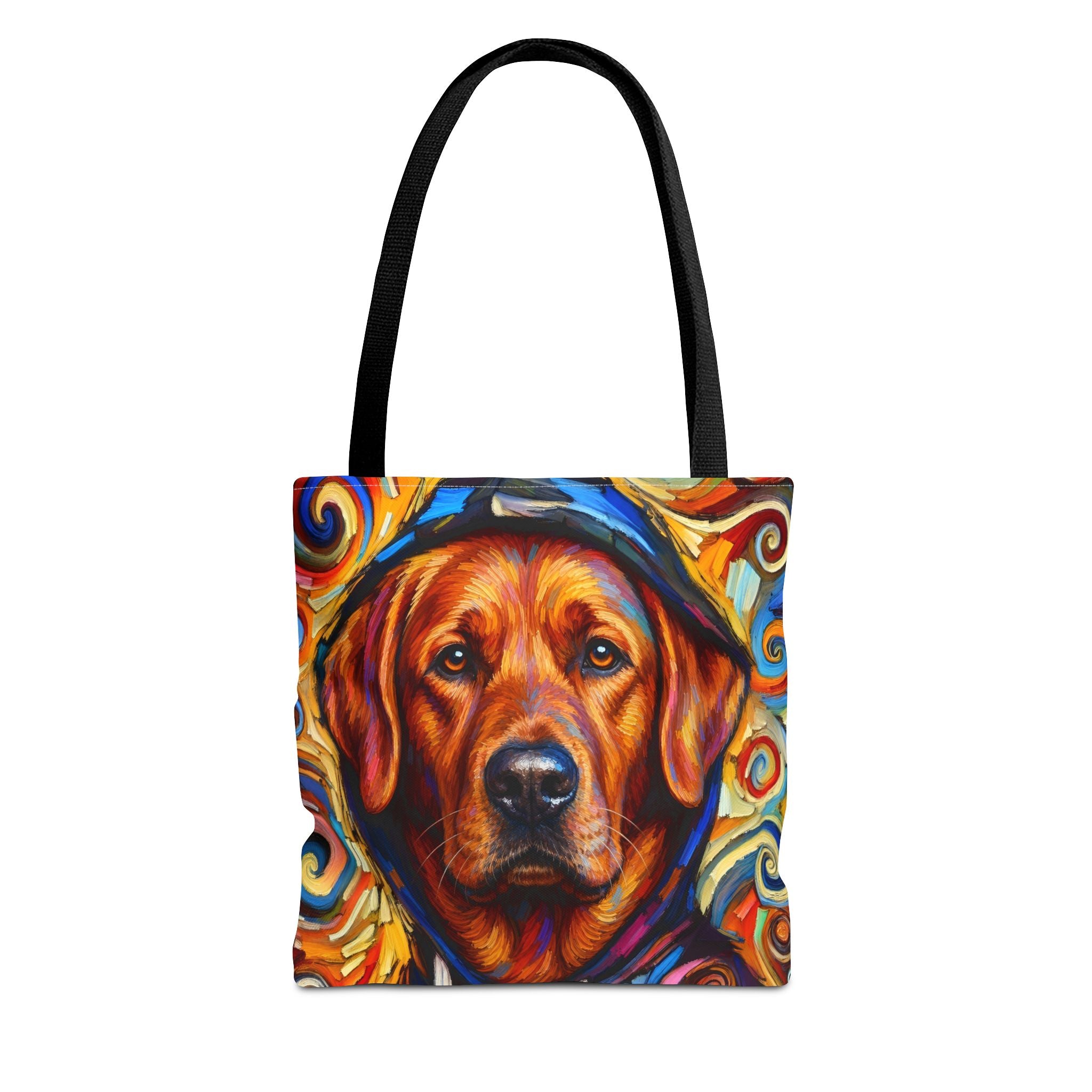 A tote bag with black handles featuring a colorful, stylized painting of a red fox Labrador Retriever face surrounded by swirling abstract patterns in blue, orange, yellow, and red.