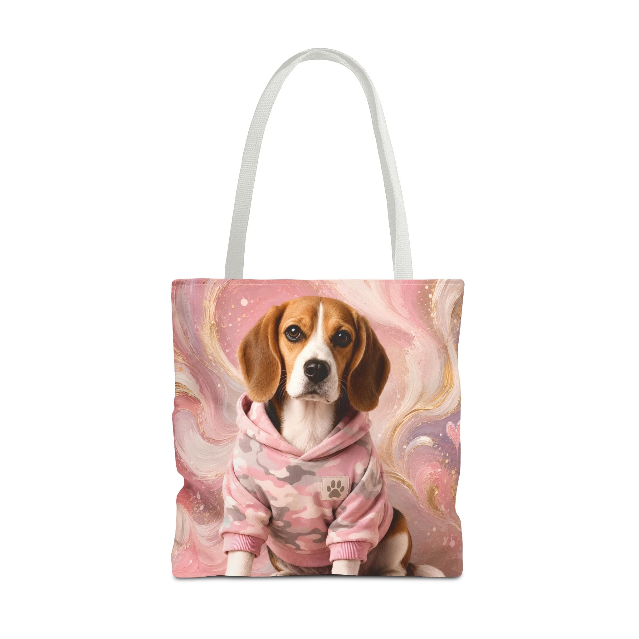 A tote bag with white shoulder straps, featuring a printed illustration of a beagle dog wearing a pink camouflage hoodie against a pink and gold marbled background.
