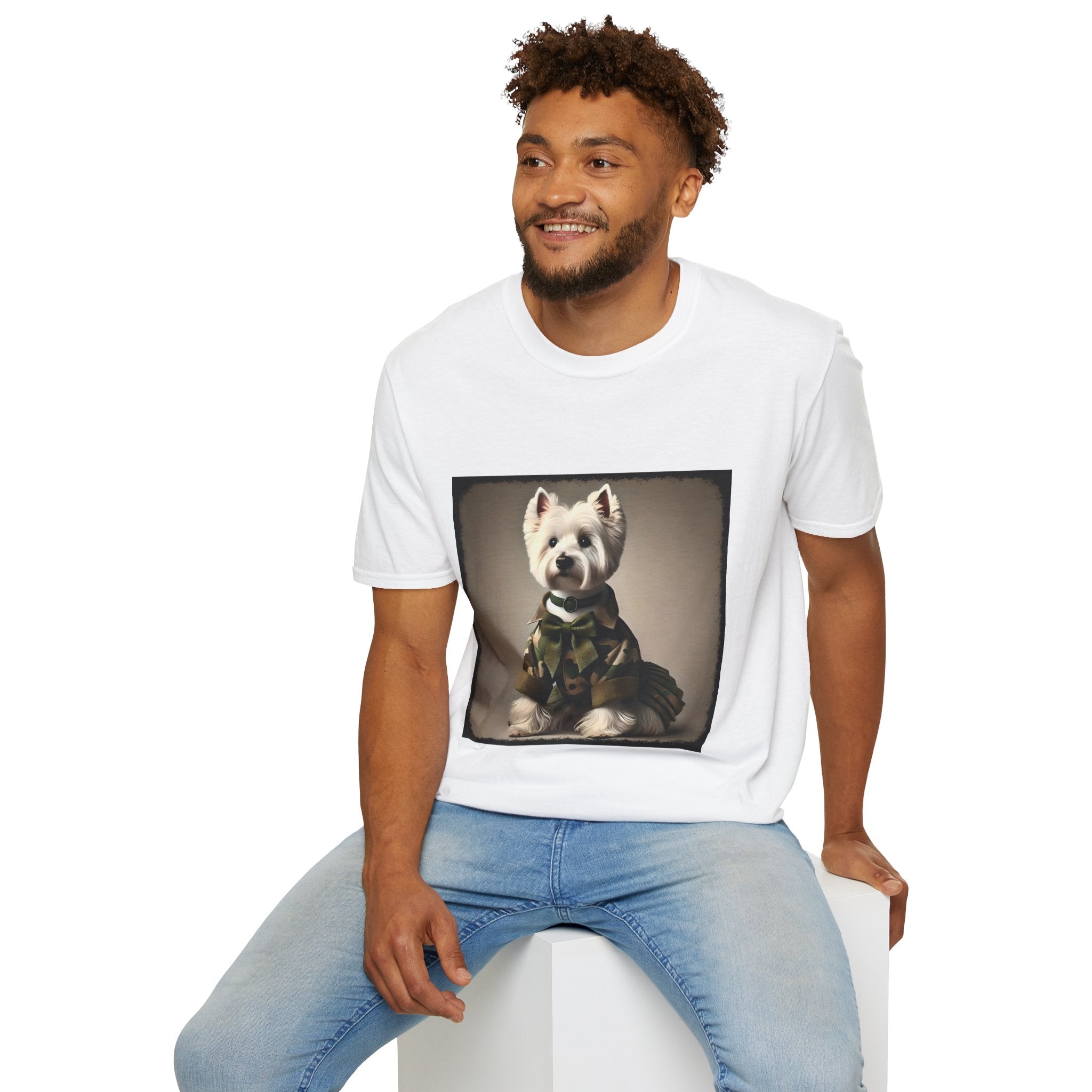 Male model in white dog t-shirt featuring Westie in camouflage jacket and pleated skirt against neutral backdrop.