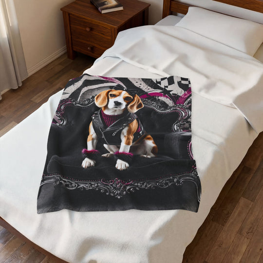 A printed throw blanket featuring a beagle dressed in a black leather jacket and purple sweater, draped over a bed with white bedding in a bedroom setting.