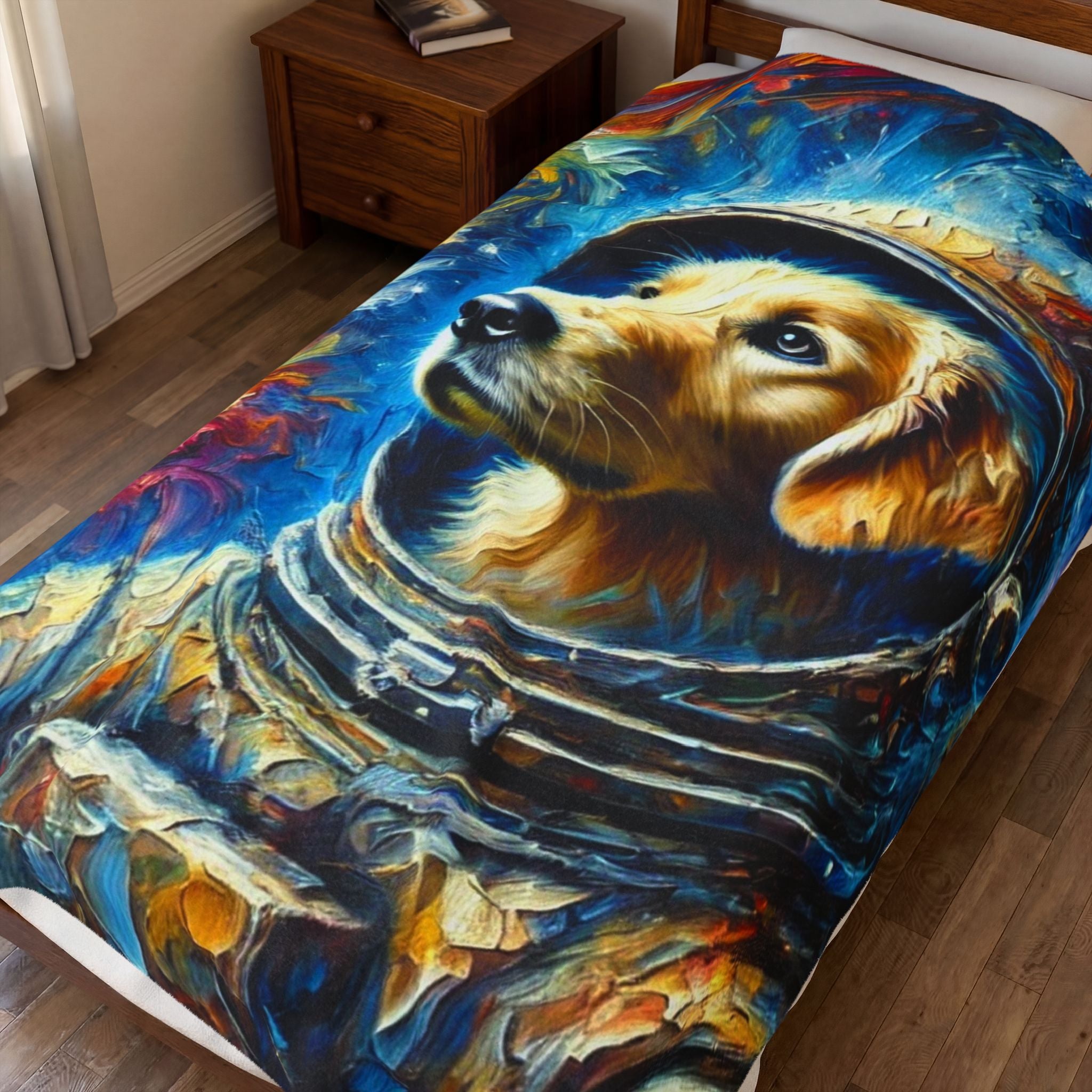 A colorful printed bedding set, likely a comforter or duvet cover, displayed on a bed in a bedroom setting. The print features a stylized, textured oil-painting style illustration of a golden retriever dog wearing a space helmet against a vibrant blue cosmic background.