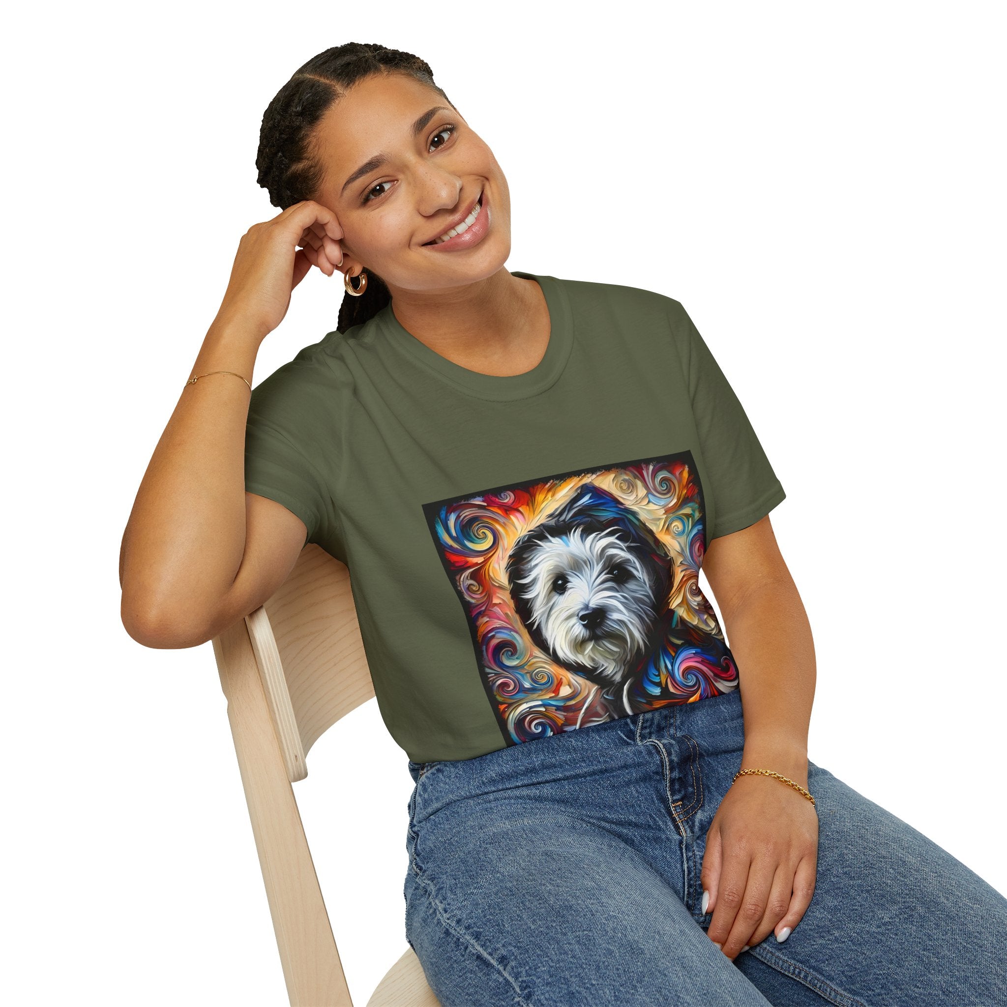 Female model in military green dog t-shirt featuring Westie in black hoodie with swirling red blue orange and gold background.