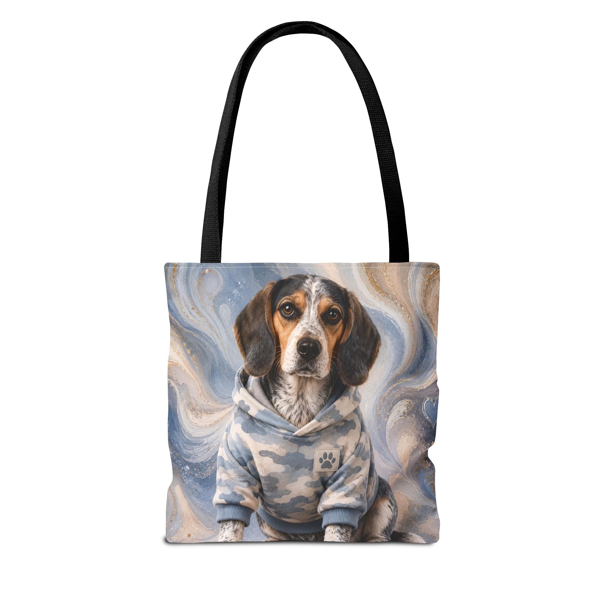 A tote bag with black handles featuring a printed illustration of a beagle wearing a blue and white hoodie against a swirling blue and beige background.