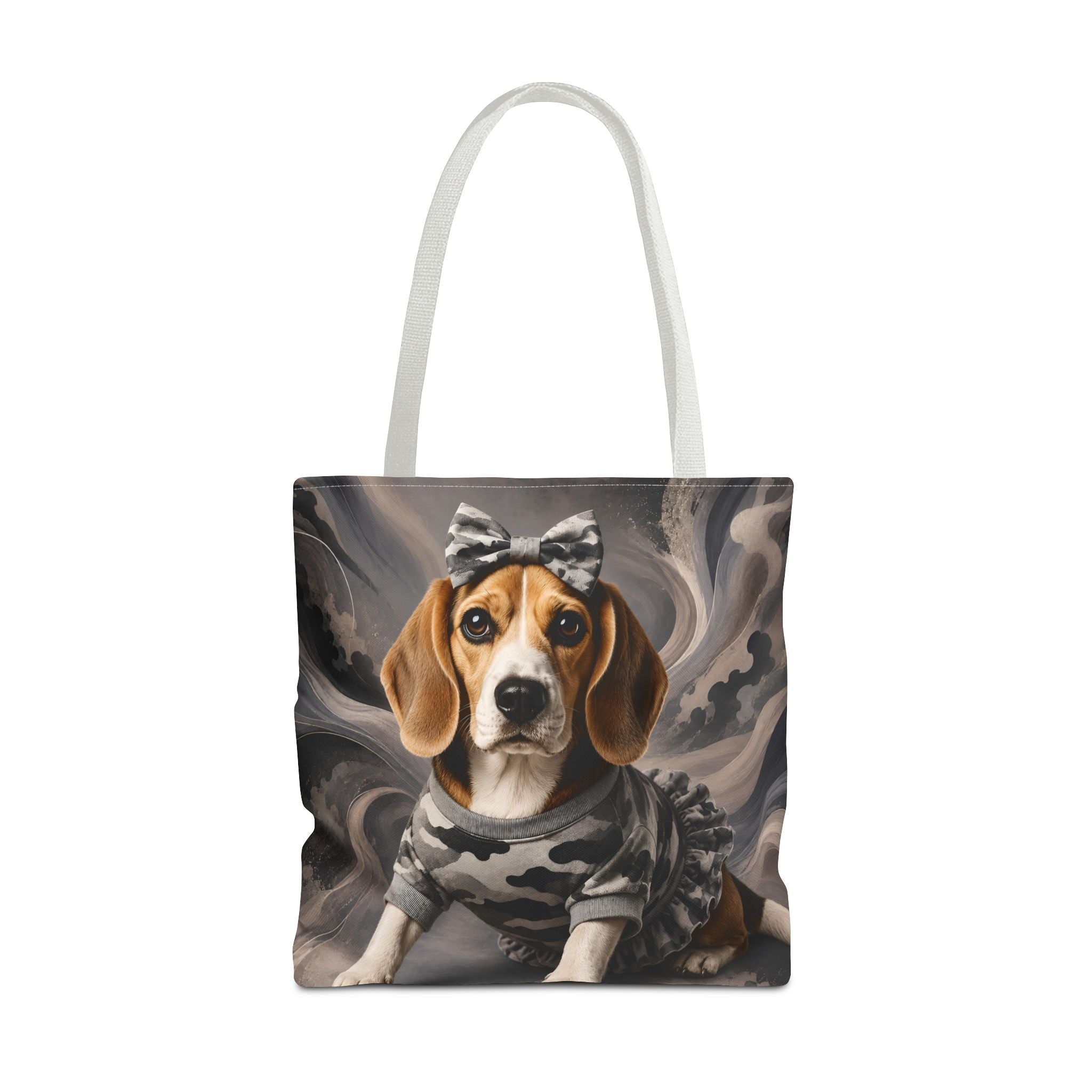 A tote bag with white handles featuring a printed illustration of a beagle wearing a gray camouflage top and a gray bow, set against a dark smoky background.