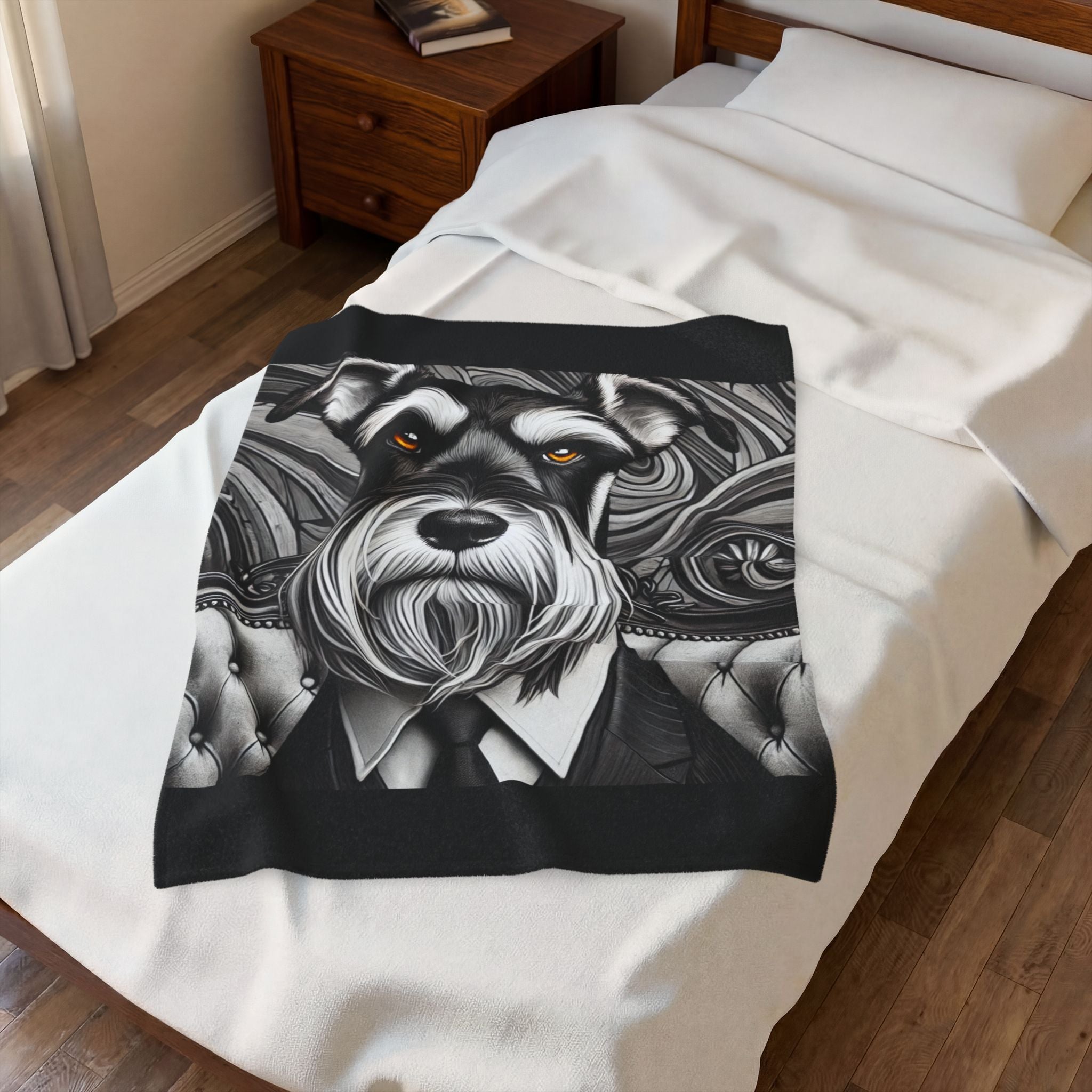 A white bedspread or blanket featuring a black and white graphic illustration of a Schnauzer dog in a suit with orange eyes, styled on a bed in a bedroom setting.