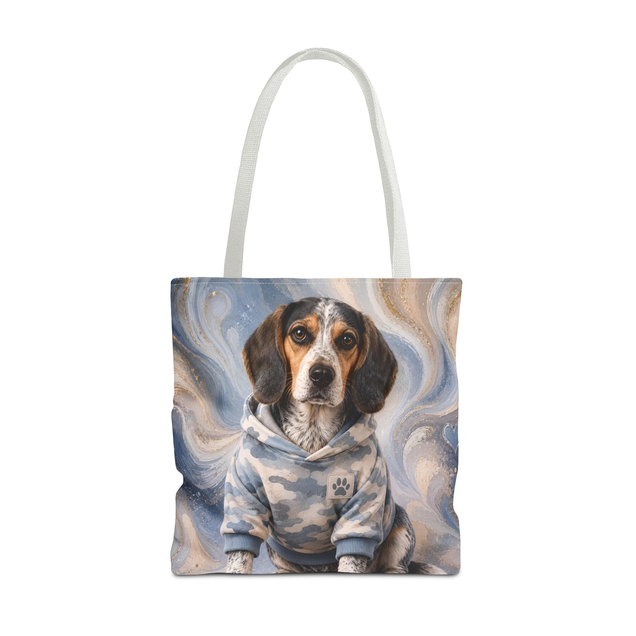 A canvas tote bag with white shoulder straps, featuring a printed illustration of a blue tick beagle dog wearing a blue and beige hoodie against a swirling blue and beige background.