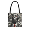 A tote bag with black shoulder straps, featuring a graphic print of a black Labrador Retriever dressed in a white shirt and tie with a red tie, set against a clean white background.