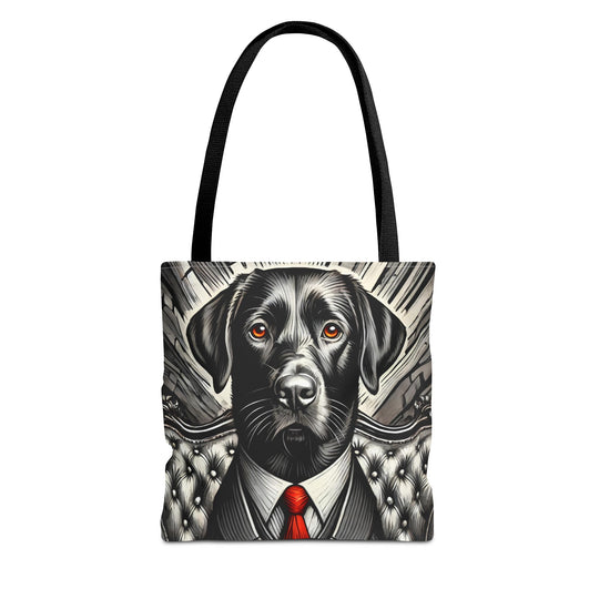 A tote bag with black shoulder straps, featuring a graphic print of a black Labrador Retriever dressed in a white shirt and tie with a red tie, set against a clean white background.