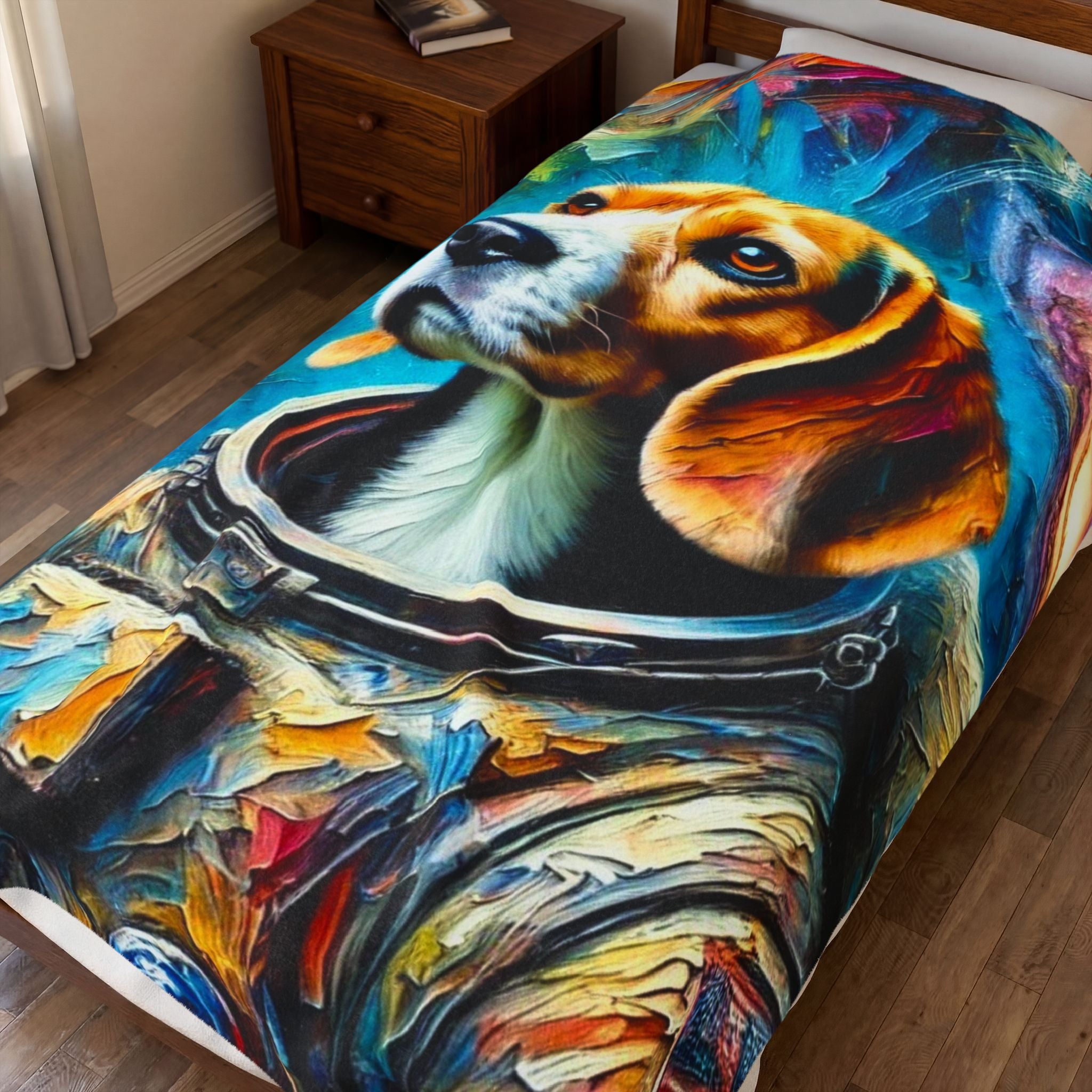 A colorful printed blanket, featuring a stylized oil-painting style portrait of a beagle dog in an astronaut helmet on a bed in a bedroom.