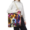 A person wearing a white cropped hoodie and black sweatpants carries a large canvas tote bag over their shoulder. The bag features a colorful, painterly portrait of a beagle with a pink bow on a plain white background.