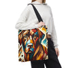 A person  carries a large tote bag with a colorful geometric chocolate Labrador retriever portrait print. The bag has a black shoulder strap and is shown against a plain white background.