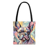A tote bag with black shoulder straps, featuring a colorful geometric art print of a French Bulldog on the front, set against a plain white background.