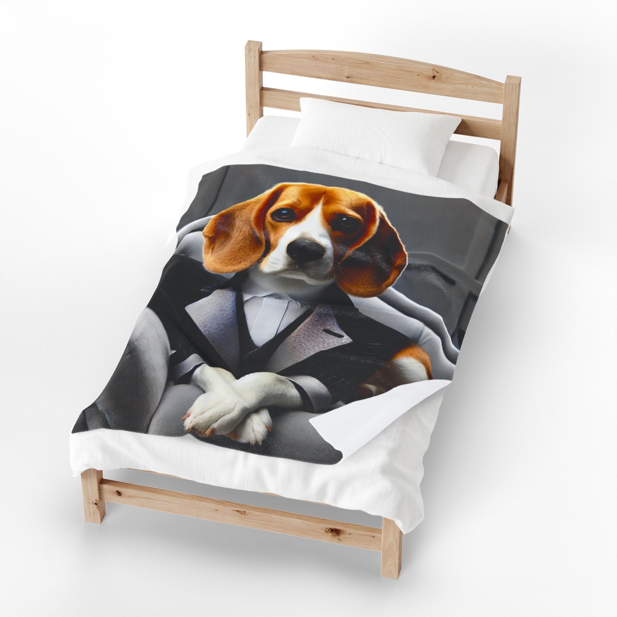 A single bed with a light wood frame, dressed in white bedding and a blanket featuring a printed graphic of a beagle dog in a tuxedo.
