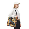 A woman wearing a white cap, white sweatshirt, and black pants carries a large tote bag featuring a colorful artistic print of a dachshund dog. The background is solid white.