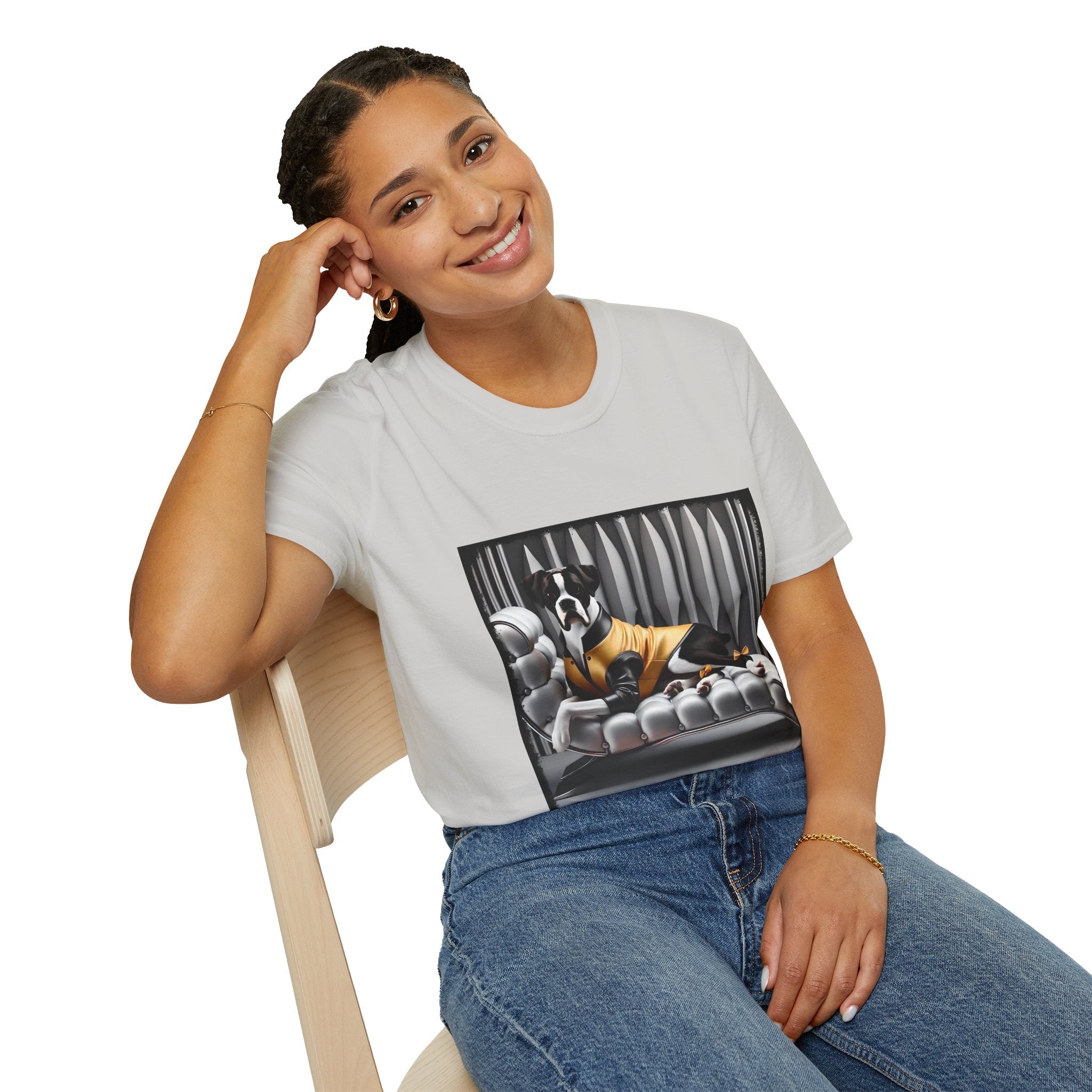 Female model in ice gray dog t-shirt featuring a black and white boxer lounging on silver tufted couch in yellow jacket with striped wall.