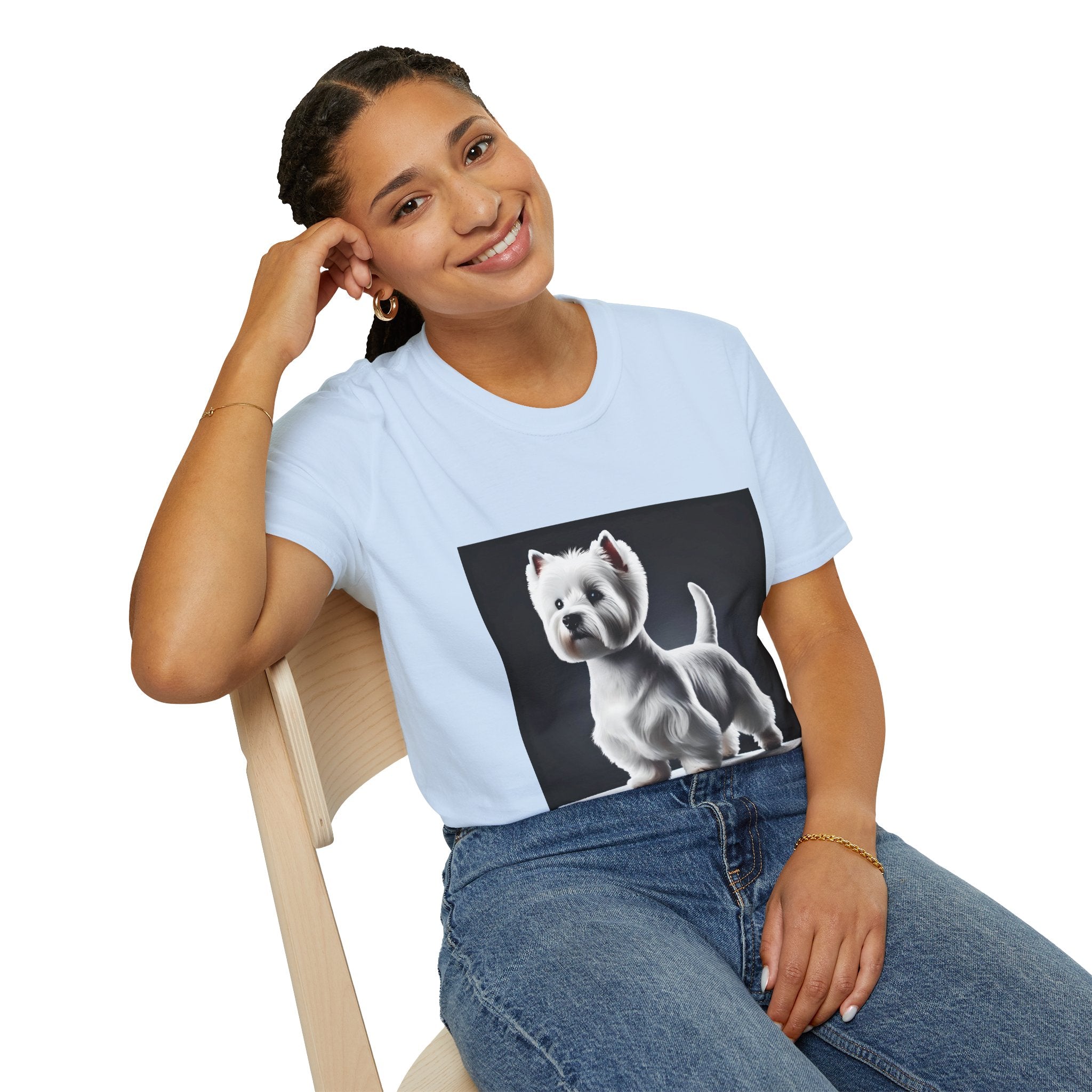 Female model in light blue dog t-shirt featuring a Westie standing proud on a platform against a dramatic dark backdrop.