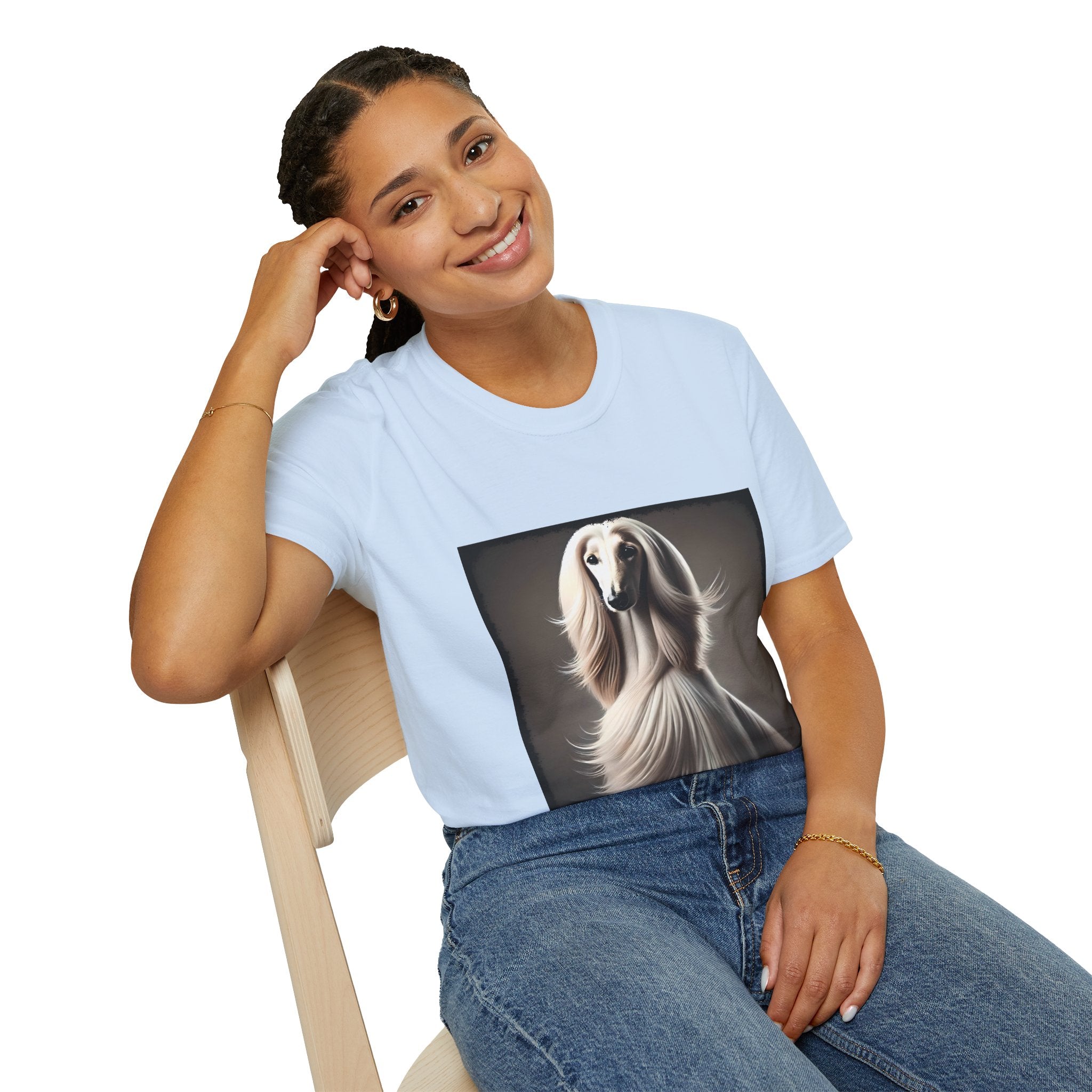 Front view of woman wearing light blue dog t-shirt featuring a White Afghan Hound with flowing hair, set against a soft background